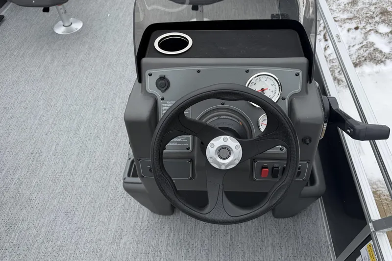 Slide: The Image of Steering console of 2026 Sun Tracker Bass Buggy 18 DLX pontoon boat. - 1