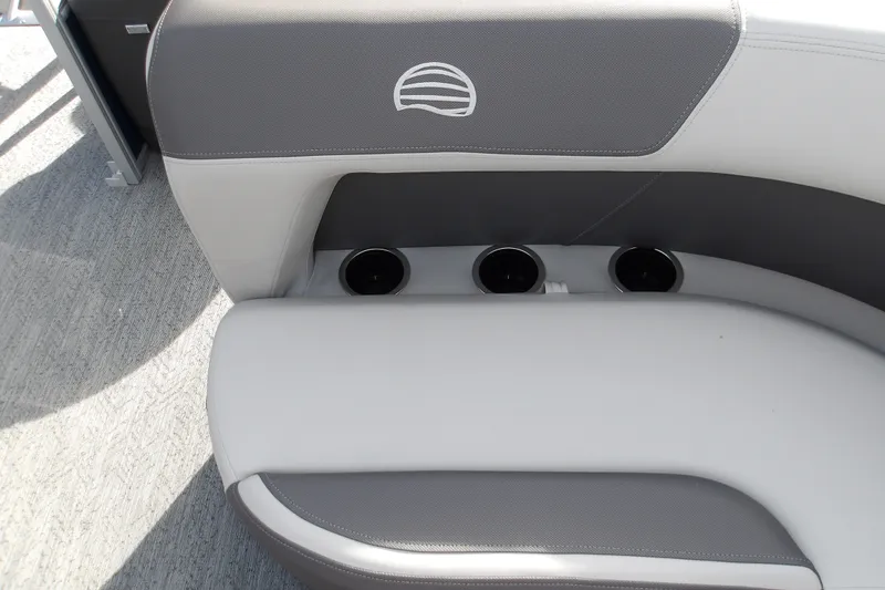 Slide: The Image of 2026 Sun Tracker Bass Buggy 18 DLX boat seat with cup holders, gray and white upholstery. - 15