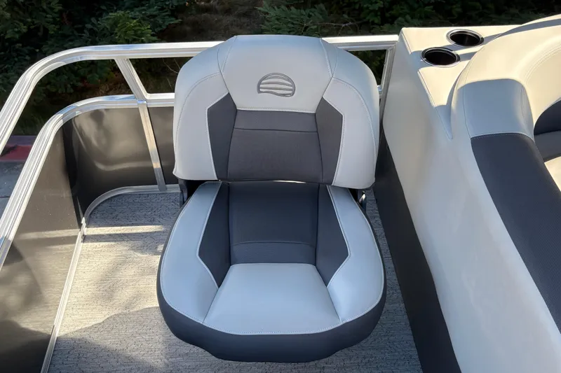 Slide: The Image of 2026 Sun Tracker Bass Buggy 18 DLX boat seat with gray and white upholstery. - 36
