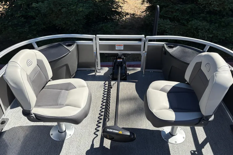 Slide: The Image of 2026 Sun Tracker Bass Buggy 18 DLX pontoon boat interior with two swivel seats. - 15