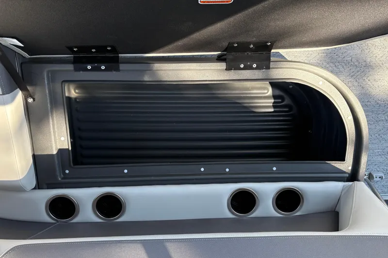 Slide: The Image of Storage compartment in 2026 Sun Tracker Bass Buggy 18 DLX boat interior. - 39