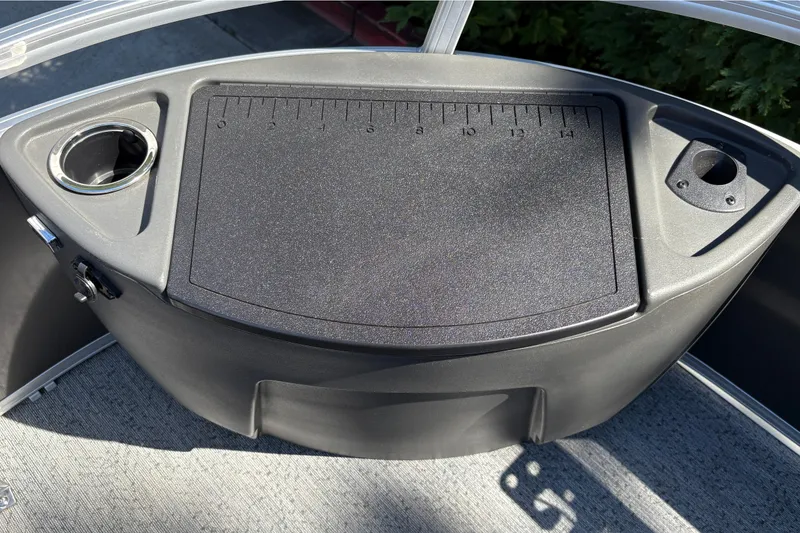 Slide: The Image of 2026 Sun Tracker Bass Buggy 18 DLX console with cup holder and measuring board. - 34