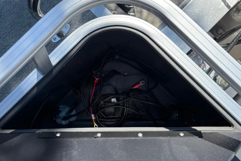 Slide: The Image of Battery compartment of 2026 Sun Tracker Bass Buggy 18 DLX pontoon boat. - 29