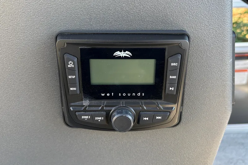 Slide: The Image of Wet Sounds audio system on 2026 Sun Tracker Bass Buggy 18 DLX boat dashboard. - 31