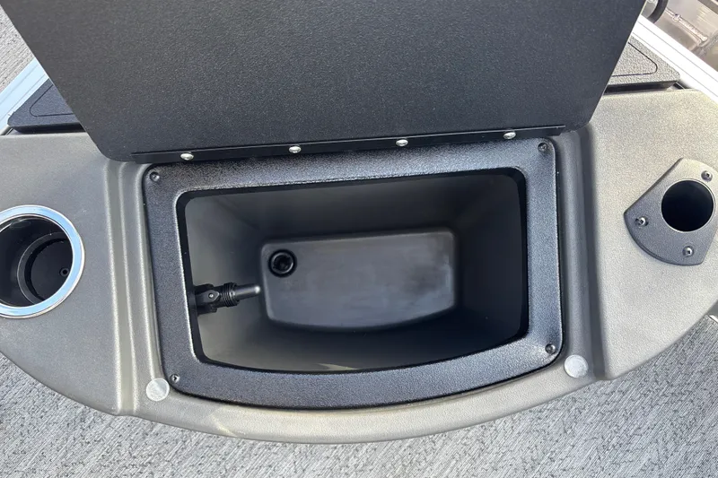 Slide: The Image of Open storage compartment on 2026 Sun Tracker Bass Buggy 18 DLX boat. - 24