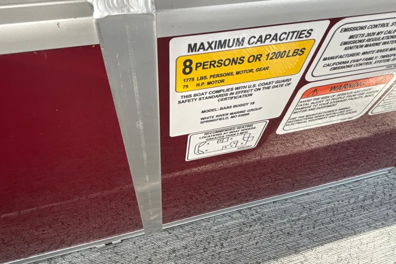 Slide: The Image of 2026 Sun Tracker Bass Buggy 18 DLX capacity label, maximum 8 persons or 1200 lbs. - 41