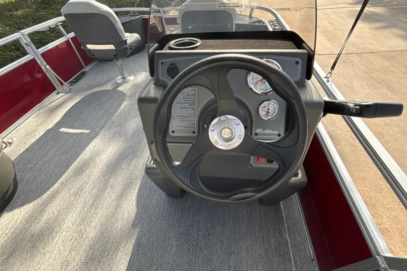 Slide: The Image of Steering console of 2026 Sun Tracker Bass Buggy 18 DLX pontoon boat. - 17