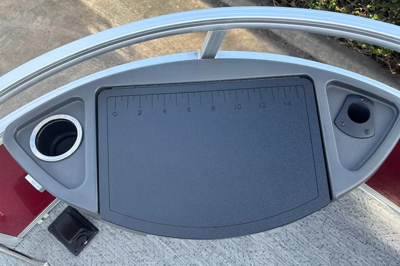 Slide: The Image of 2026 Sun Tracker Bass Buggy 18 DLX console with cup holder and ruler. - 29