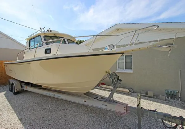 Slide: The Image of Parker Marine 2520 Deep Vee Sport Cabin 2001 - 2