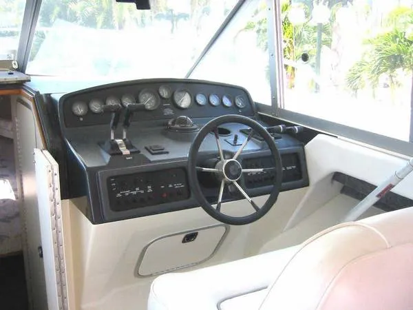 Slide: The Image of Sea Ray 310 Sport Bridge 1992 - 4