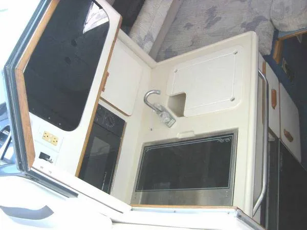 Slide: The Image of Sea Ray 310 Sport Bridge 1992 - 7