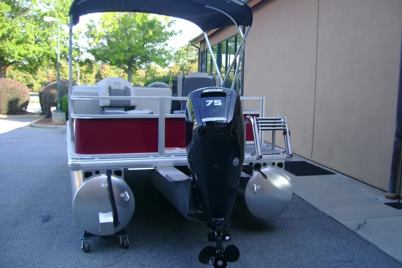 Slide: The Image of 2026 Sun Tracker Bass Buggy 18 DLX pontoon boat with Mercury 75 outboard motor. - 4