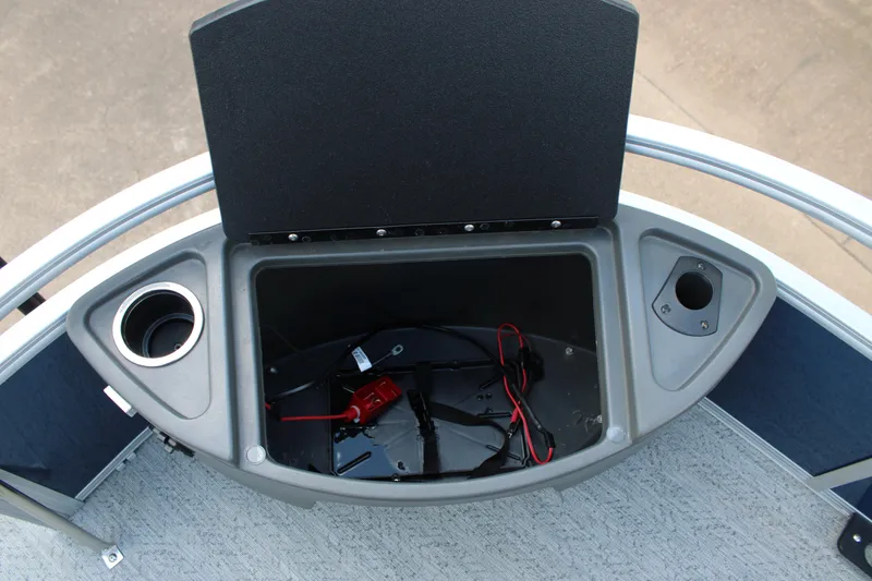 Slide: The Image of Open storage compartment on 2026 Sun Tracker Bass Buggy 18 DLX pontoon boat. - 9