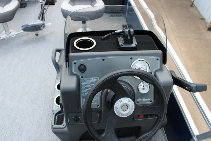 Slide: The Image of Steering console of 2026 Sun Tracker Bass Buggy 18 DLX pontoon boat. - 3