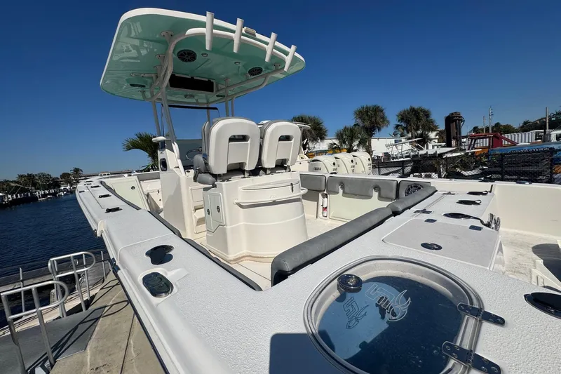 Slide: The Image of 2023 Sea Chaser 27 HFC CC boat with spacious deck and modern features. - 11