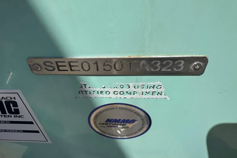 Slide: The Image of 2023 Sea Chaser 27 HFC CC boat identification plate with certification labels. - 12