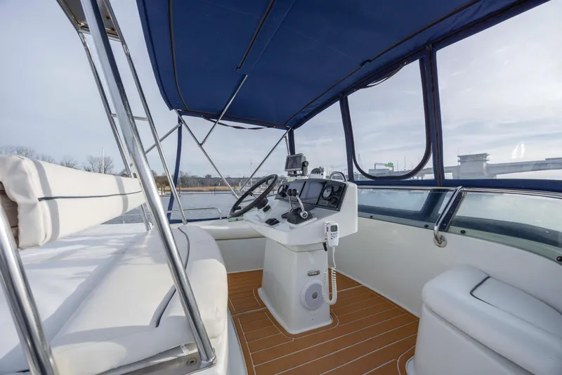 Slide: The Image of Interior view of 2004 Lagoon 43 PC yacht cockpit with navigation equipment. - 27
