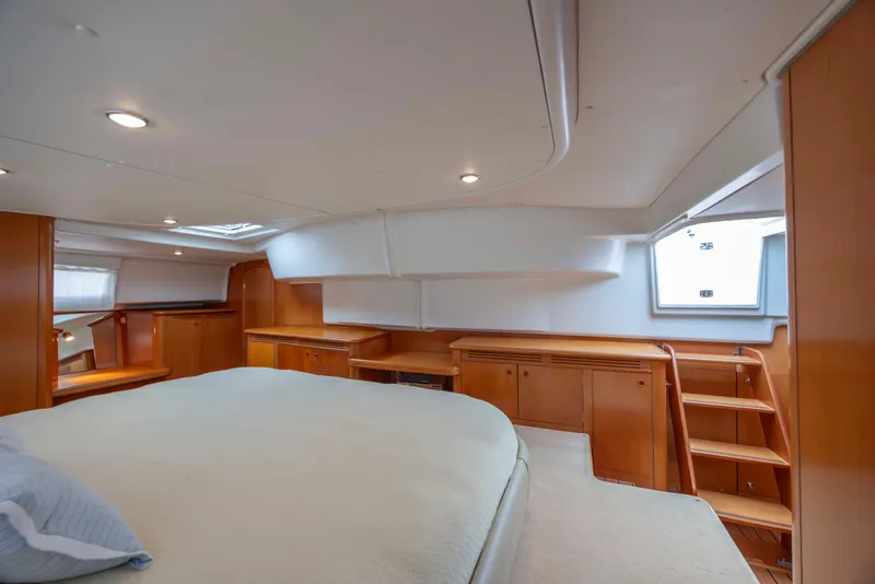 Slide: The Image of Luxurious cabin interior of 2004 Lagoon 43 PC yacht with wooden furnishings. - 37