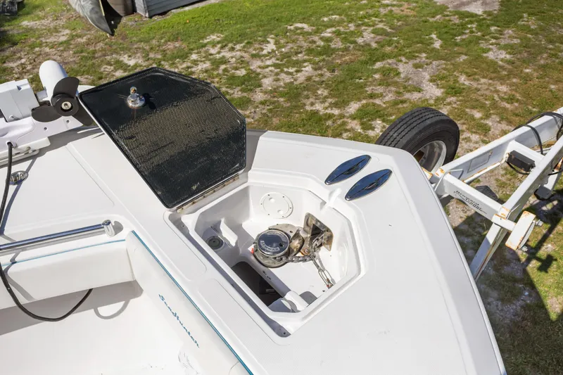 Slide: The Image of Bow view of 2016 SeaHunter 41 Tournament boat on trailer, showcasing anchor compartment. - 17