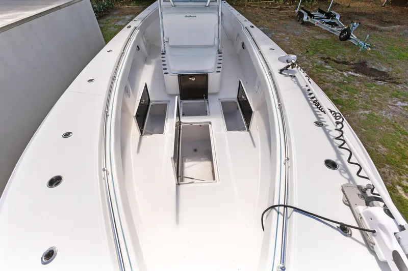 Slide: The Image of 2016 SeaHunter 41 Tournament boat deck with open storage compartments. - 20