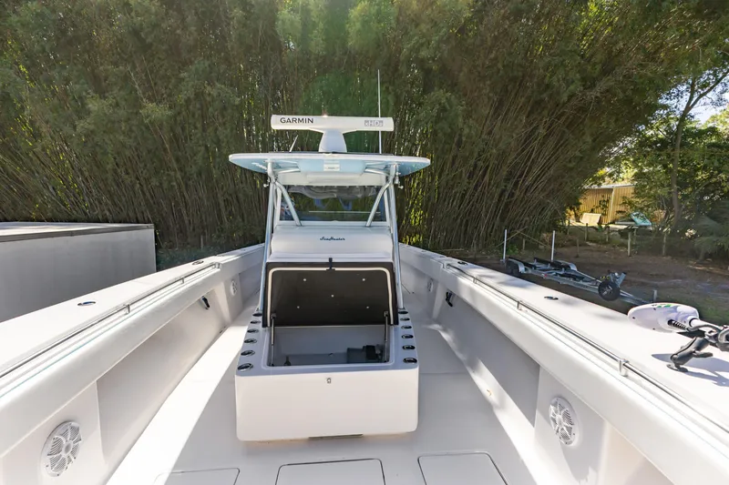 Slide: The Image of 2016 SeaHunter 41 Tournament boat with Garmin radar, spacious deck, and storage compartment. - 23
