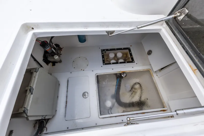 Slide: The Image of 2016 SeaHunter 41 Tournament boat compartment with equipment and storage. - 52