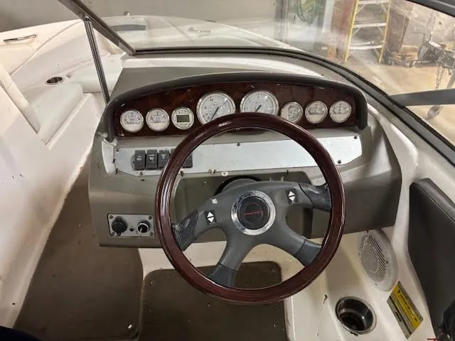 Slide: The Image of Dashboard of a 2006 Regal 1900 Bowrider boat. - 8