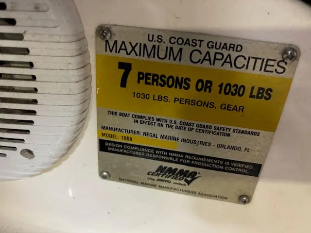 Slide: The Image of US Coast Guard capacity label for Regal 1900 Bowrider, 7 persons or 1030 lbs. - 9