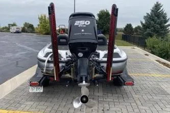Slide: The Image of 2017 Nitro Z21 boat with 250 Pro motor in parking lot. - 3