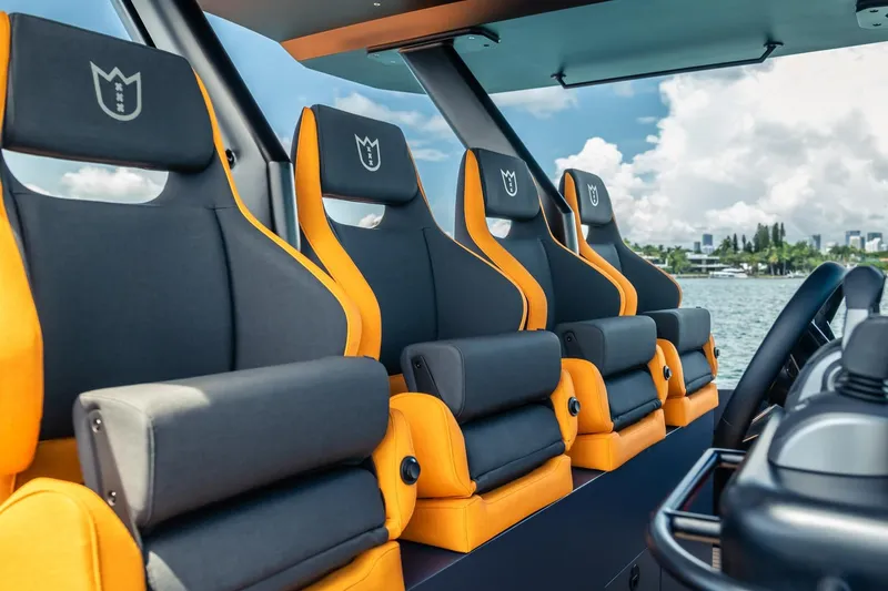 Slide: The Image of Luxurious seating on 2024 Lekker 44 boat, featuring sleek design and vibrant colors. - 3