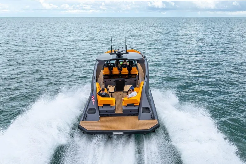 Slide: The Image of 2024 Lekker 44 boat cruising on open water with vibrant seating. - 9