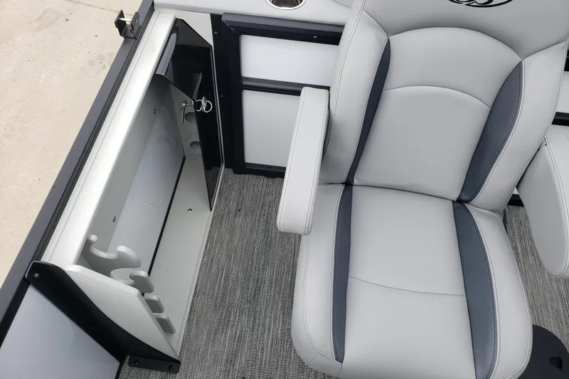 Slide: The Image of 2026 Bentley Pontoons Fish 223 N-Cruise interior with gray seating and storage compartment. - 10