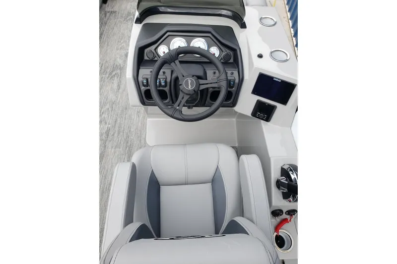 Slide: The Image of 2026 Bentley Pontoons Fish 223 N-Cruise dashboard with steering wheel and controls. - 13