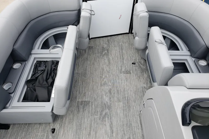 Slide: The Image of 2026 Bentley Pontoons Fish 223 N-Cruise interior with gray seating and storage compartments. - 19