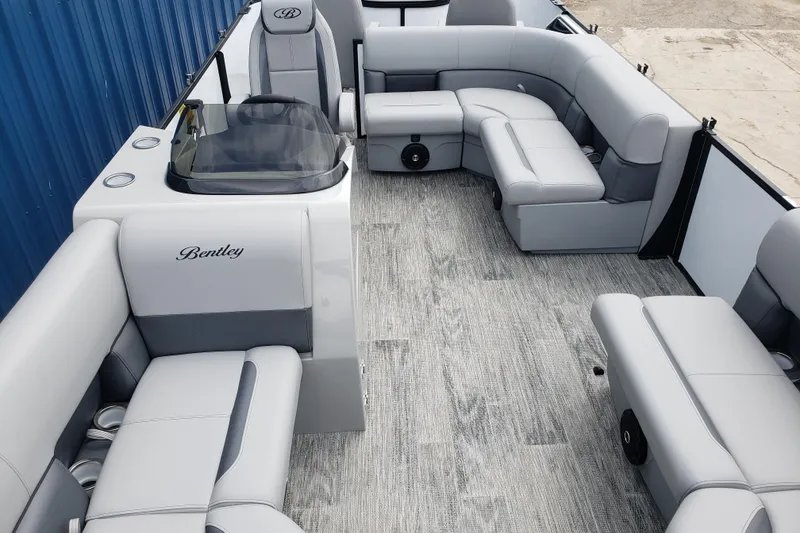 Slide: The Image of 2026 Bentley Pontoons Fish 223 N-Cruise interior with luxurious gray seating and modern design. - 20