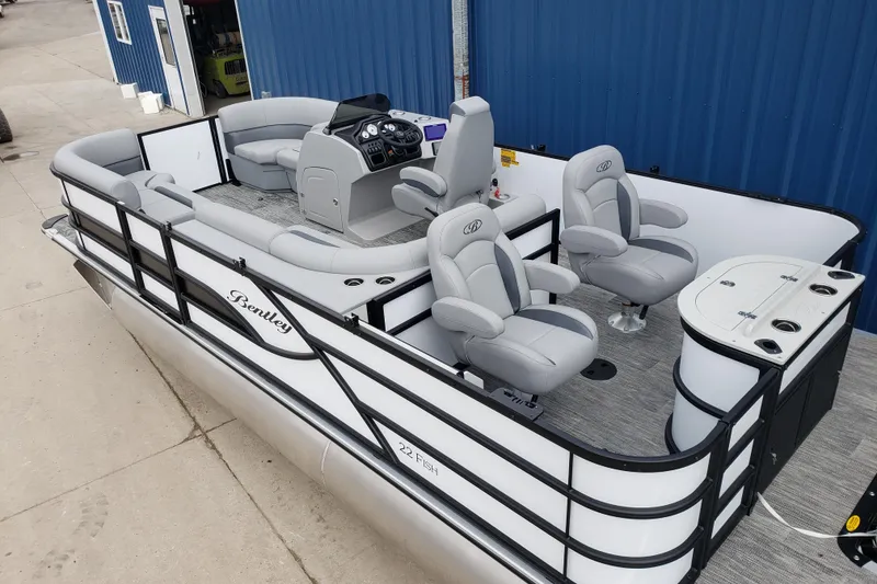 Slide: The Image of 2026 Bentley Pontoons Fish 223 N-Cruise with luxurious seating and modern design. - 7