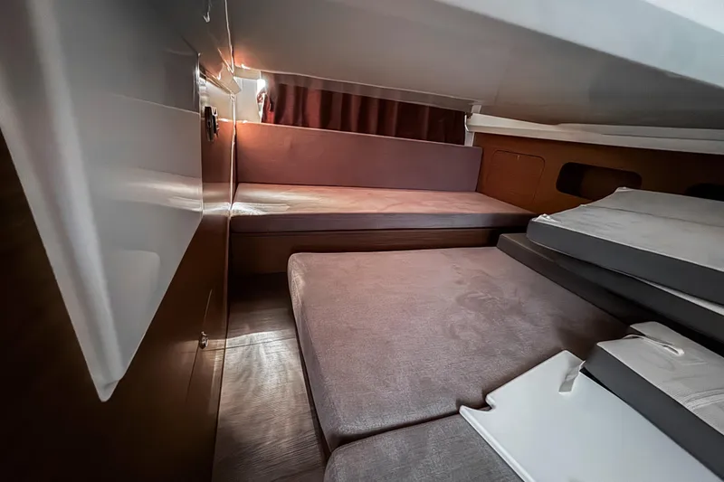 Slide: The Image of 2023 Beneteau Antares 11 cabin interior with modern design and comfortable seating. - 26