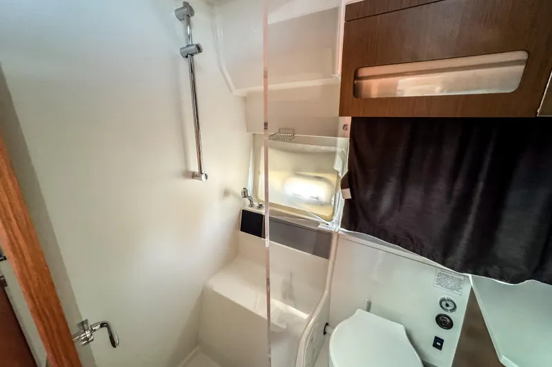 Slide: The Image of Modern bathroom in 2023 Beneteau Antares 11 boat with shower and toilet. - 36