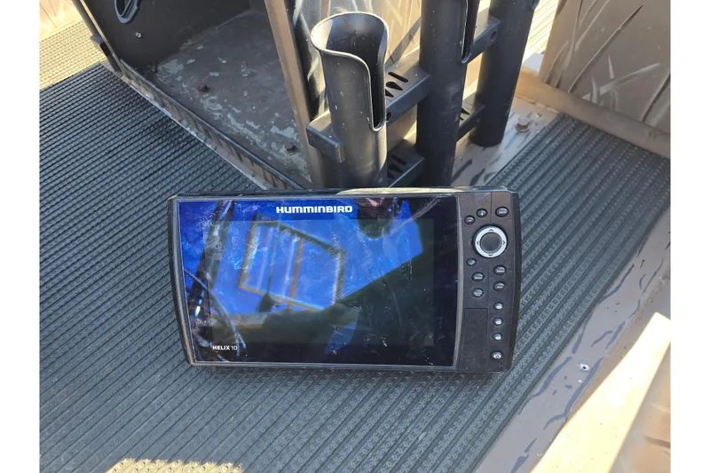 Slide: The Image of Humminbird Helix 10 fish finder on 2018 Pro-Drive 1754 boat floor. - 10