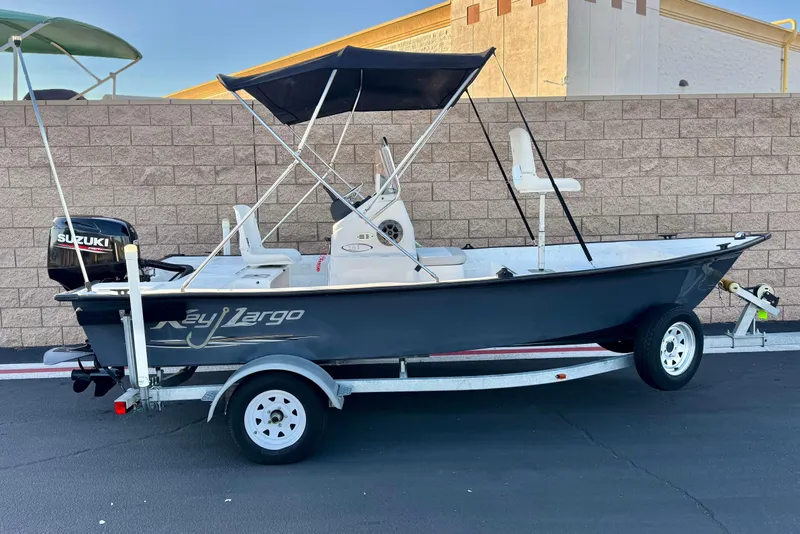 The Image of 2018 Caravelle Key Largo 161 boat with Suzuki outboard motor on trailer. - 0