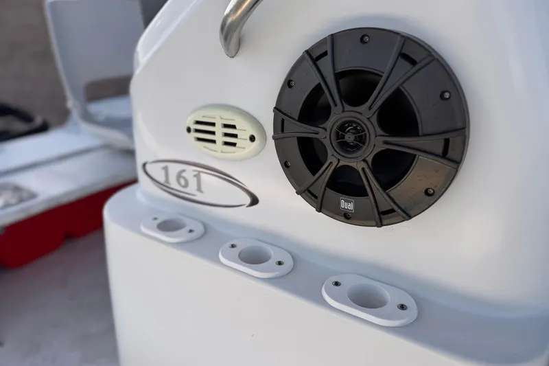 Slide: The Image of 2018 Caravelle Key Largo 161 boat speaker and rod holders detail. - 15
