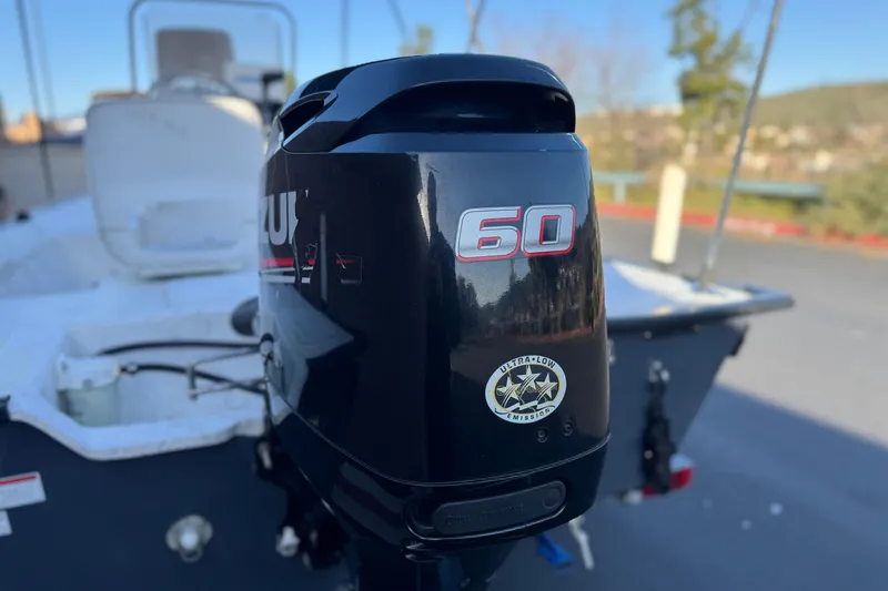 Slide: The Image of 2018 Caravelle Key Largo 161 boat with Suzuki 60 outboard motor. - 7