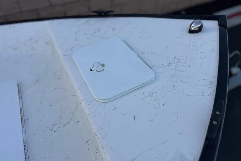 Slide: The Image of 2018 Caravelle Key Largo 161 boat deck with hatch and latch detail. - 9