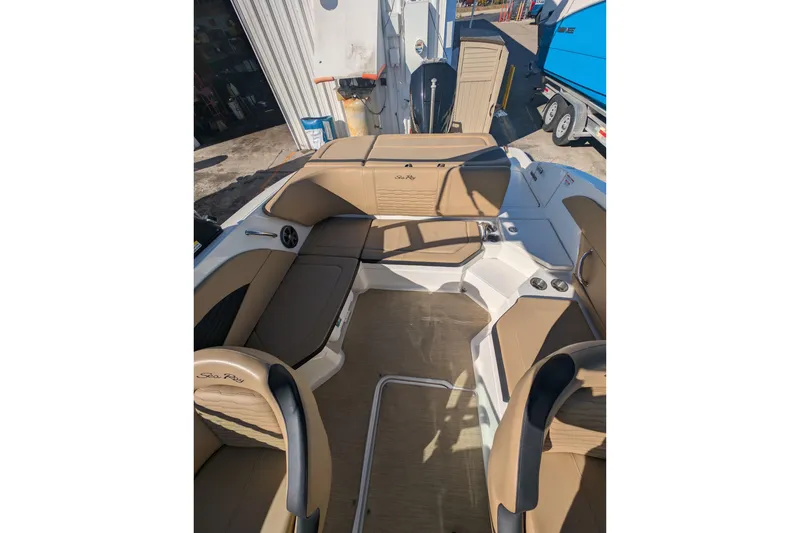 Slide: The Image of Interior view of 2021 Sea Ray 21 SPX OB boat with tan seating and modern design. - 5