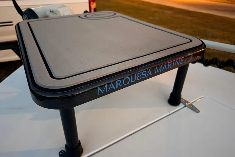 Slide: The Image of 2004 Hell's Bay Devilray boat platform with Marquesa Marine branding. - 15