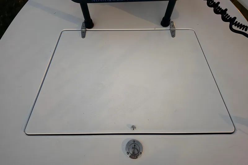 Slide: The Image of 2004 Hell's Bay Devilray boat deck with hatch and latch detail. - 17