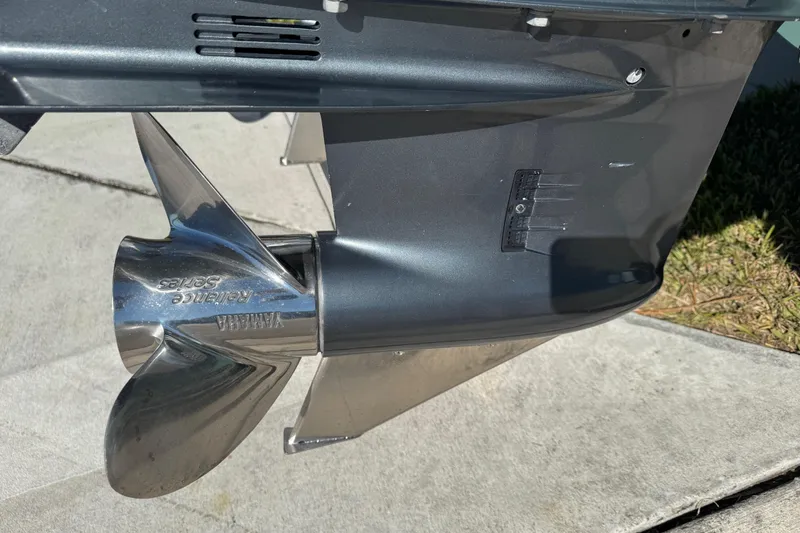 Slide: The Image of Close-up of a Yamaha Reliance Series propeller on a 2022 NauticStar 2602 Legacy boat. - 12
