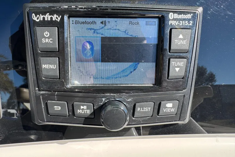 Slide: The Image of Simrad display on 2022 NauticStar 2602 Legacy showing water temperature and speed. - 45