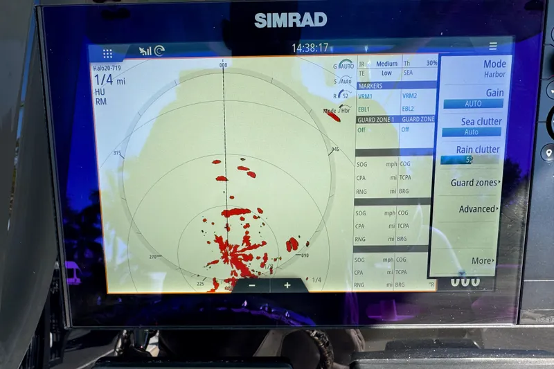 Slide: The Image of 2022 NauticStar 2602 Legacy boat interior with compass and seating area. - 51
