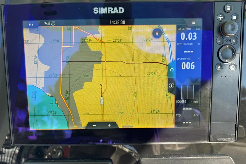 Slide: The Image of 2022 NauticStar 2602 Legacy capacity label, 12 persons or 1675 lbs, on boat deck. - 52